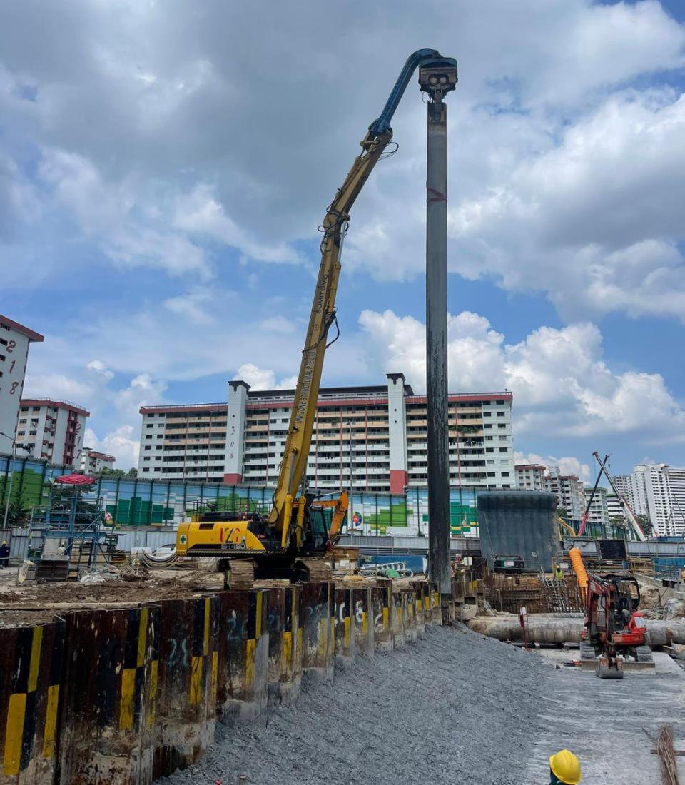 Sheet pile rig and crawler crane working at NSC tunnel drainage diversion site