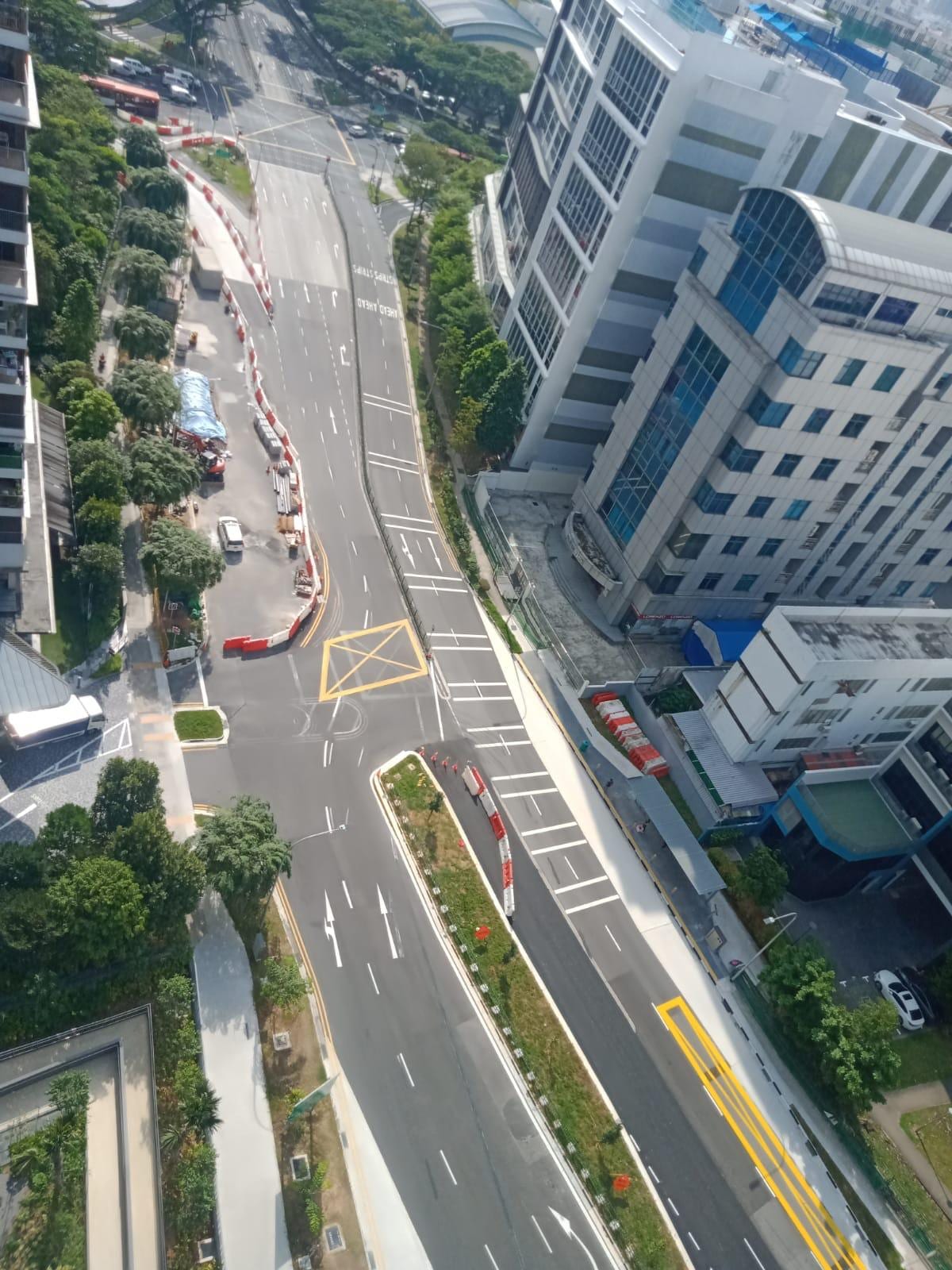 Aerial view of completed road widening project by Buildwick Engineering — dual carriageway with new junction marking, footpath and cycling path