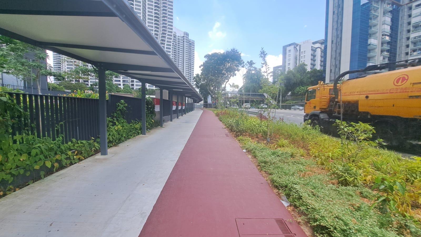 Completed footpath, cycling path and bus shelter — LTA commuter infrastructure