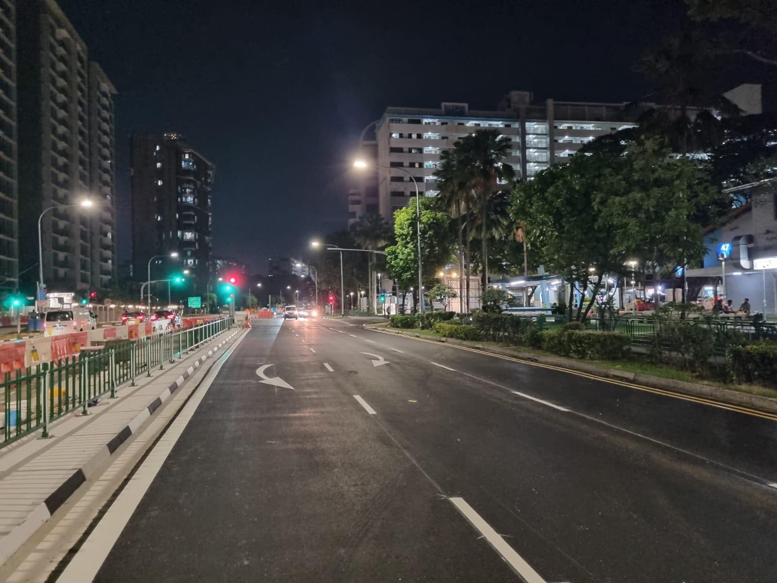Newly resurfaced road with arrow markings — opened to traffic at night